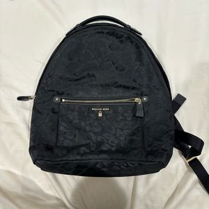 Pre-Owned Michael Kors Leopard Black Backpack with Gold Hardware